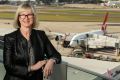 Sydney Airport chief executive Kerrie Mather is pushing for a relaxation of a cap on flight movements.