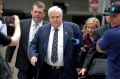 Clive Palmer arrives at the Federal Court last September to answer questions regarding the fall of Queensland Nickel.