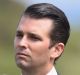 Donald Trump jnr, Eric Trump and Ivanka Trump listen to their father, Donald Trump, give a press conference at his Trump ...