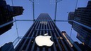 FILE - In this Sept. 5, 2014, file photo, the Apple logo hangs in the glass box entrance to the company's Fifth Avenue store in New York. Apple is appealing a European Union order to collect a record 13 billion euros ($14 billion) in taxes, following a similar appeal by Ireland. The move comes about four months after EU competition authorities said Apple owed back taxes based on the way it reports European-wide profits through Ireland. (AP Photo/Mark Lennihan, File)