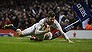 CARDIFF, WALES - FEBRUARY 11:  Elliot Daly of England dives past Alex Cuthbert of Wales to score the match winning try during the RBS Six Nations match between Wales and England at the Principality Stadium on February 11, 2017 in Cardiff, Wales.  (Photo by Shaun Botterill/Getty Images)