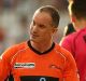 Green and gold, finally: Michael Klinger celebrates a half-century for the Scorchers in the BBL.