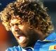 Lasith Malinga of Sri Lanka celebrates taking the wicket of D'Arcy Short.