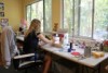 Sarak Blakey working on a plushie in her Sunshine Coast home.