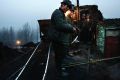 China is considering reinstating coal output restrictions to avoid the return of a glut after easing limits during winter.
