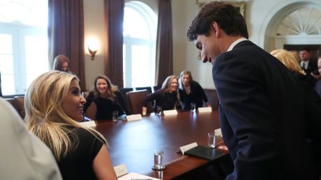 Eyes for him only ... Ivanka Trump and Justin Trudeau.