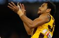 Hawk Cyril Rioli thrills fans with a spectacular grab.