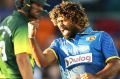 Lasith Malinga of Sri Lanka celebrates taking the wicket of D'Arcy Short.