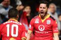 Three to the good... Dylan McGowan of Adelaide is pumped up after putting his side 3-1 up.