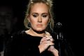 Technical issues didn't slow the winning pace for Adele at the Grammys where she won five awards, including album and ...
