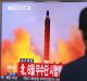 A man watches a TV news program on North Korea's missile launches at Seoul Railway Station, South Korea.