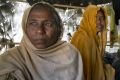 Women and children in a makeshift house they share with six others in a Rohingya refugee camp in Cox's Bazar, ...