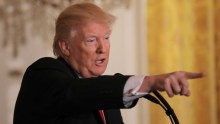 US President Donald Trump takes questions during a news conference.