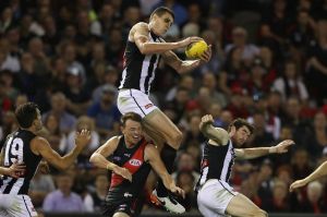 High flyer: Mason Cox in action for the Magpies.