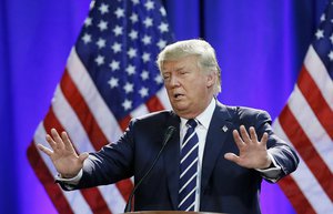 Republican presidential candidate Donald Trump addresses a GOP fundraising event, Tuesday, Aug 11, 2015, in Birch Run, Mich.