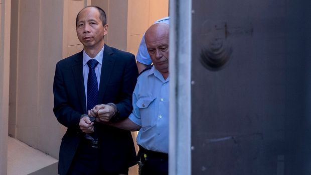 Robert Xie is led away after he was sentenced this week.
