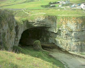 Smoo Cave is a large combined sea cave and freshwater cave in Durness in Sutherland, Highland, Scotland.