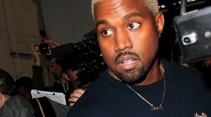 Kanye West (and his new bleached blonde 'do) leaves the Yeezy show fashion during New York Fashion Week.