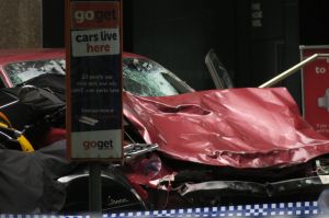 The crumpled car at the scene in Bourke Street after the carnage.