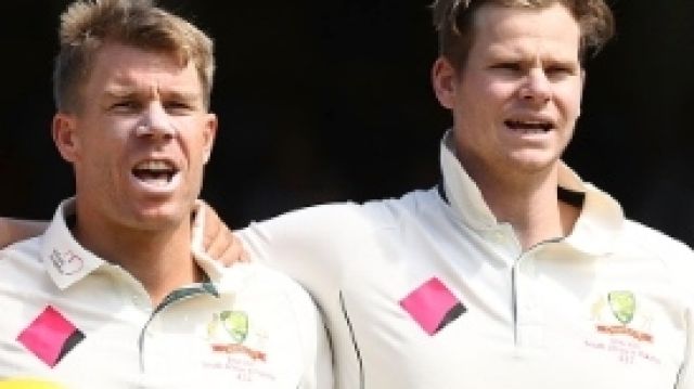 SYDNEY, AUSTRALIA - JANUARY 03: Nathan Lyon, David Warner and Steve Smith of Australia sing the national anthem during ...