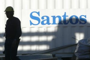 Santos reporting an underlying profit of $US63 million once a previously announced $US1.1 billion impairment is stripped out.