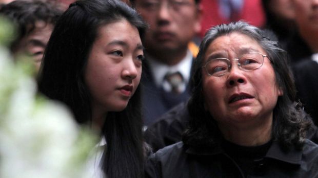 Brenda Lin and her grandmother Feng Qing Zhu at the Lin family funeral in 2009.