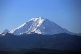 Mount Rainier is visible as hot air balloons fly near Enumclaw early Friday, May 13, 2016.