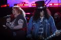 Guns N' Roses singer Axl Rose (left) and guitarist Slash perform at the MCG on Tuesday night.