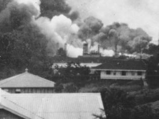 The scene near the Darwin wharf at about 10.20 am on 19 February 1942, viewed from Railway Hill.