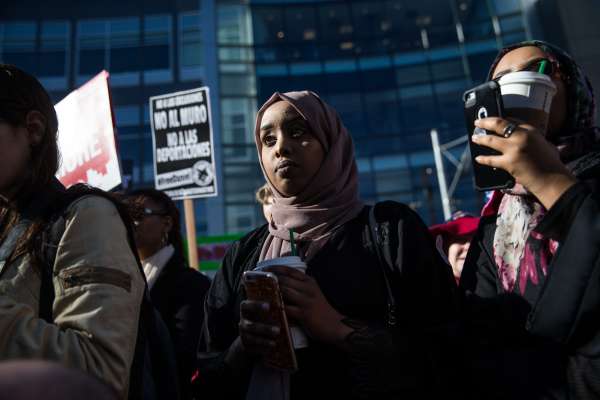 Protesters gather to urge Amazon to follow up on their statements on recent immigration action by allowing all workers a fair and consistent prayer policy, at Amazon in Seattle on Friday, Feb. 17, 2017.