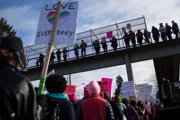 Demonstrators gathered to counter a defund Planned Parenthood protest outside a Planned Parenthood in Kent, Wash. on Saturday, Feb. 11, 2017.