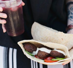 Authentic street food: Taameya in baladi pocket bread with hibiscus tea.