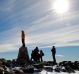 On top of Australia. Climbers at the summit of Mount Kosciuszko, 2228m above sea level.