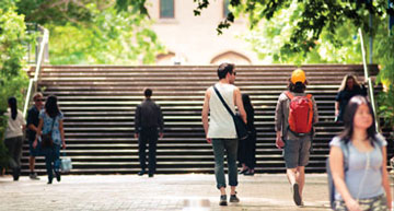 students walking through the campus