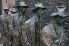 statue of men in unemployment line