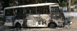 A bus torched in protests by Naga tribesmen over the election, due on February 1 but postponed.