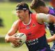 MELBOURNE, AUSTRALIA - DECEMBER 16: Billy Slater of the Storm runs with the ball during a Melbourne Storm NRL training ...