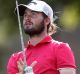 Keeping his eye on the ball: Curtis Luck of Australia.