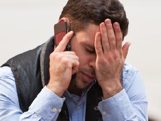 Portrait of man talking on phone