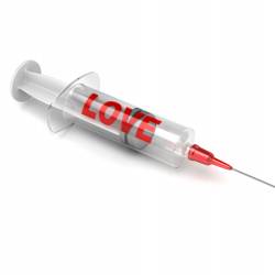 A syringe with the word "LOVE" on the side.