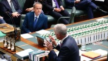 Bill Shorten listens to Malcolm Turnbull during Question Time.