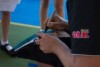 Port Adelaide player Dan Hewson signs a guernsey at St Joseph's School at Renmark during an AFL Country Camp.