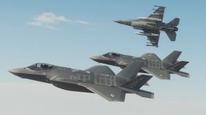 A Royal Australian Air Force F-35A flies in formation with a US Air Force F-35 and F-16 during trial flights from Luke ...