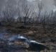 Smouldering remains of a property after a fire at Carwoola, southeast of Canberra. 