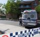 Police at the scene of the fatal stabbing in Padstow.