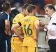 Socceroos coach Ange Postecoglou remains positive after spending time in London keeping an eye on Australian players in ...