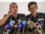 Malaysia's National Police Deputy Inspector-General Noor Rashid Ibrahim, left, speaks as Selangor Police Chief Abdul Samah Mat listens during a press conference at the Bukit Aman national police headquarters in Kuala Lumpur, Malaysia, Sunday, Feb. 19, 2017.  Malaysia's police are looking for four more North Korean suspects who they say left the country the same day the North Korean leader's brother died after being attacked at the Kuala Lumpur airport. (AP Photo/Vincent Thian)