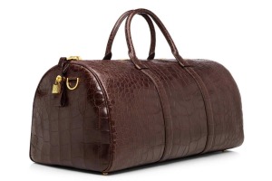 <b>Tom Ford Buckley Alligator Duffle</b><br>
If even the best simply won't do, this is the bag for you. Crafted of ...