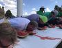 Tim Nicholls enters melon-eating contest.