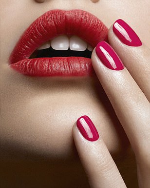 083594-004 FOR EDITORIAL USE ONLY. CLEAR MODEL RIGHTS FOR COVER USE. MINIMUM FEE APPLIES. 10 tips for beginners. A close up image of female's face with bright red lipstick and red nail varnish. Obligatory Credit - CAMERA PRESS / Madame Figaro / Frederic Farre